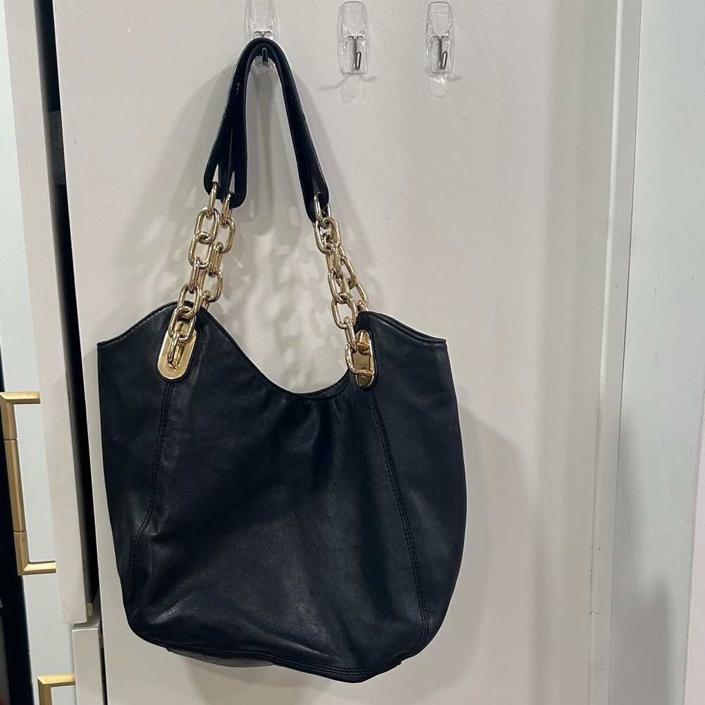 Michael Kor’s Butter Soft Black Women's Shoulder Bag with Gold Chain Detail
